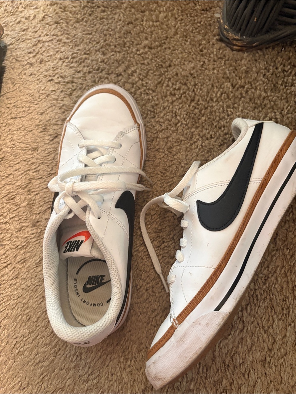 Nike White Low-Top Sneakers with Black Swoosh and Brown Trim